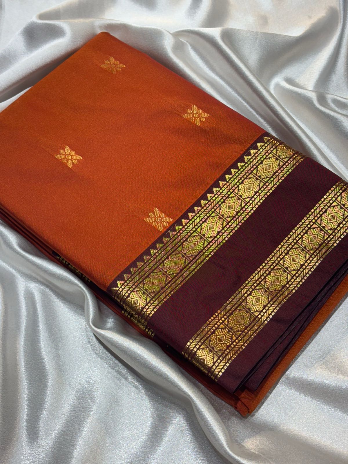 Beautiful rust orange semi silk saree