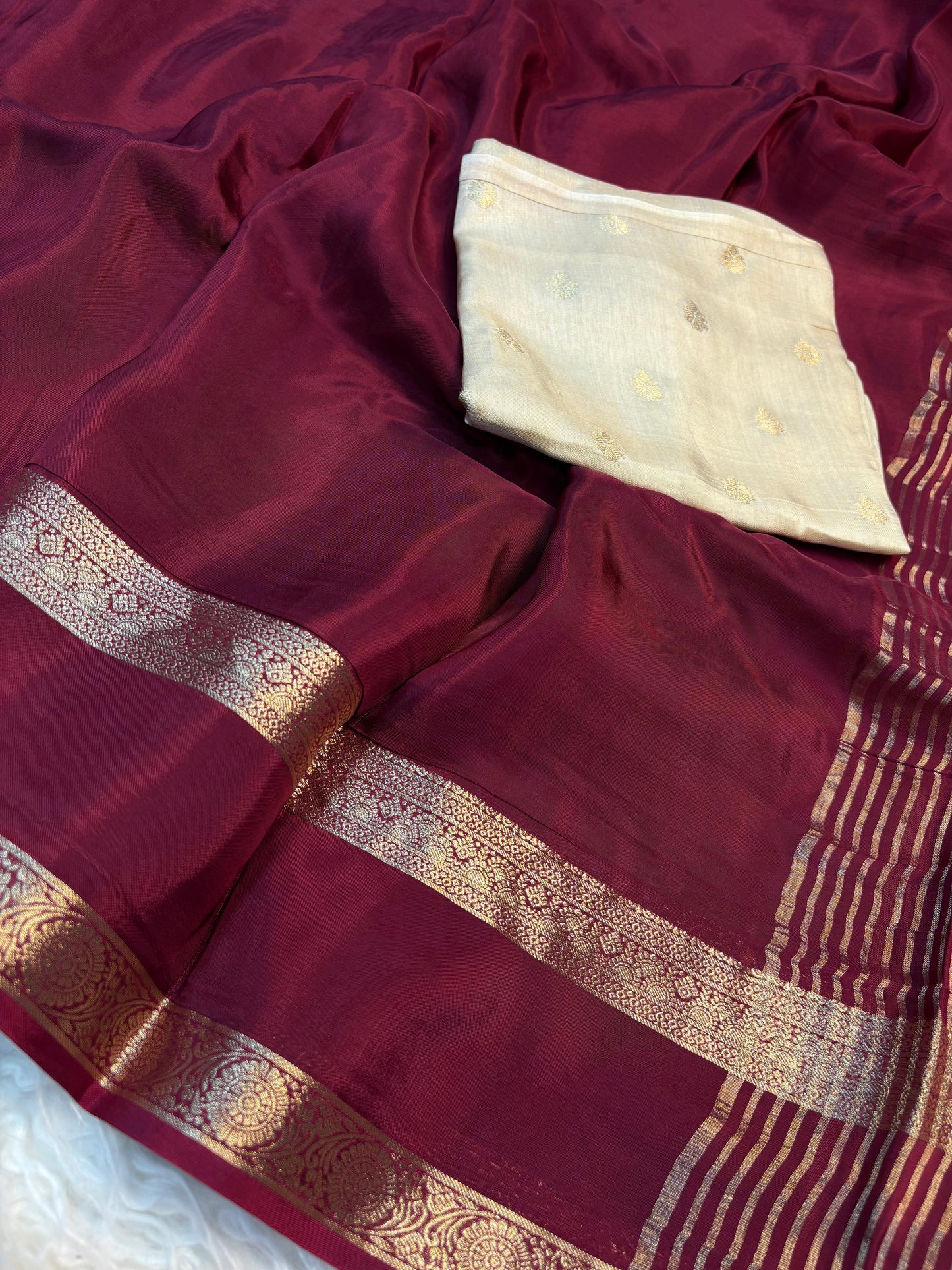 Beautiful soft viscous crape silk saree with double zari jacquard border and dola silk blouse piece