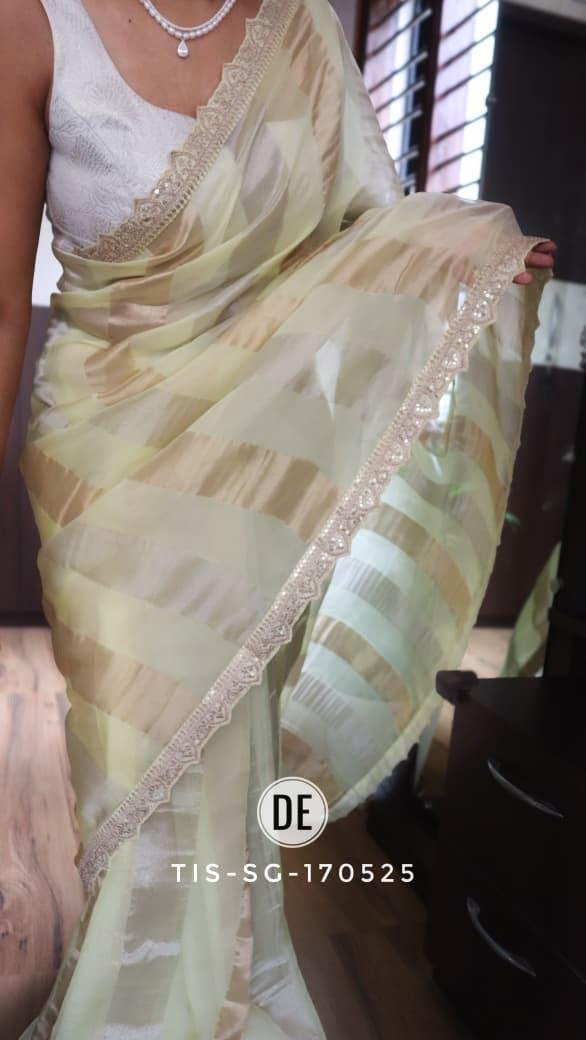 Pure organza tissue in silver and gold zari stripes saree