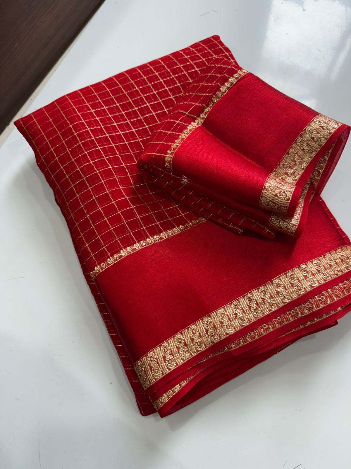 Beautiful viscous georgette saree with checks body and running blouse