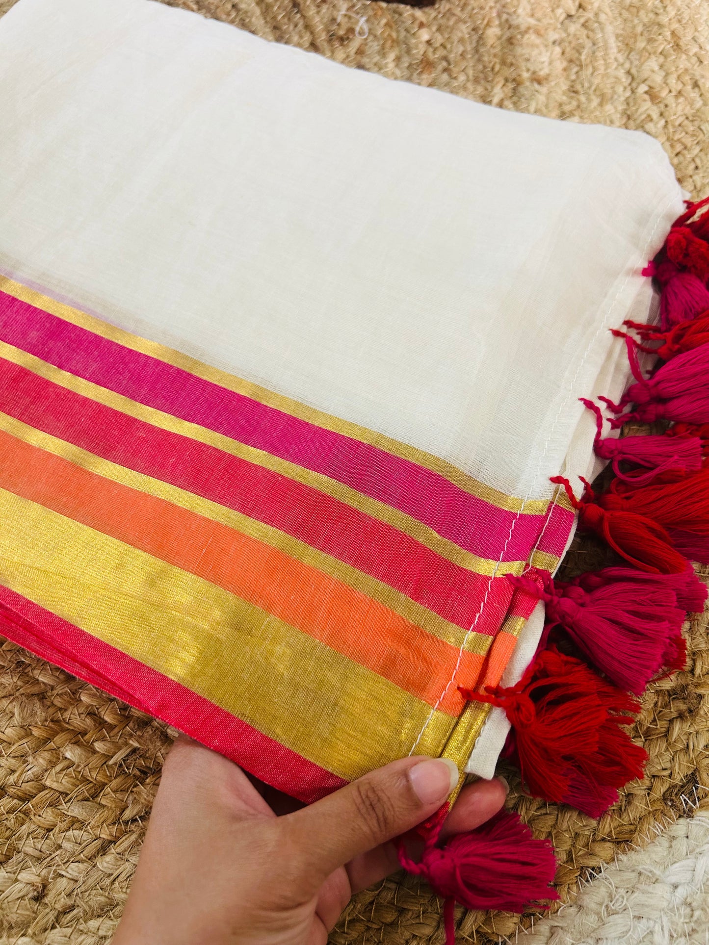 Pure and authentic mul cotton saree with multicolor zari border and beautiful tassels