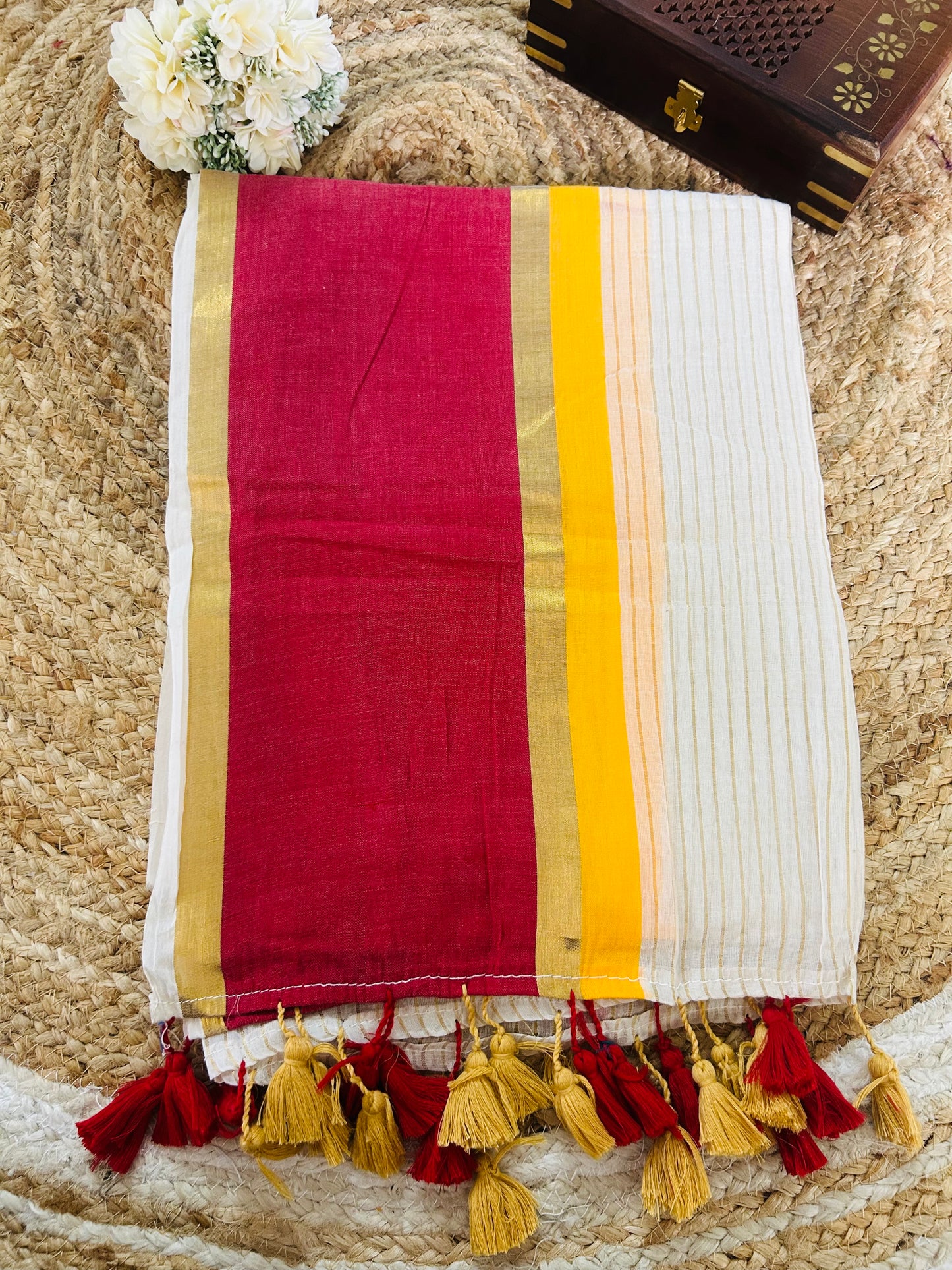 Pure and authentic mul cotton saree with zari stripes all over body and red yellow border