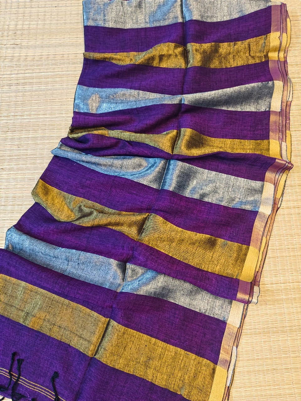 Linen sarees with gold silver zari stripes all over!