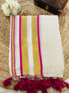 Pure and authentic mul cotton saree with zari stripes all over body and pink zari border