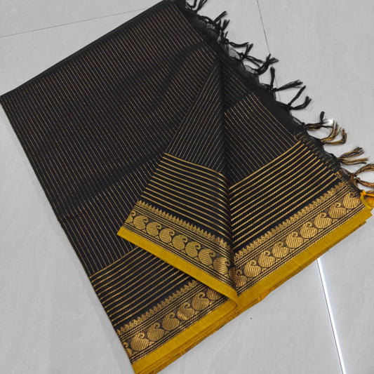 Beautiful black pure kanchi cotton saree with zari stripes and small mango border