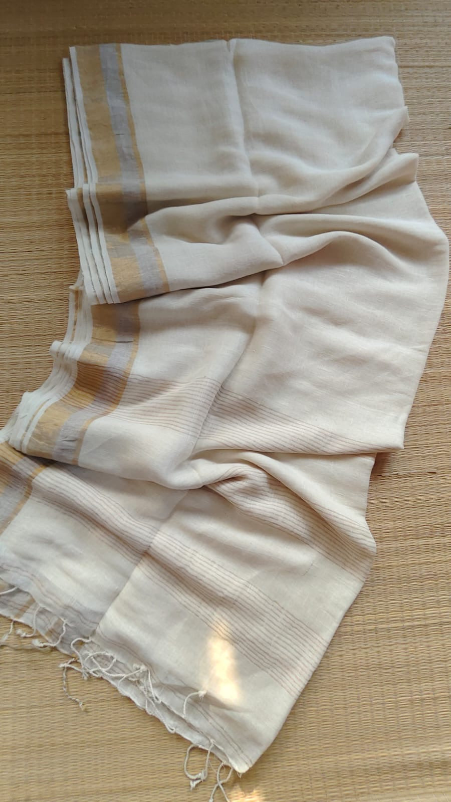 Pure handwoven linen saree with zari borders