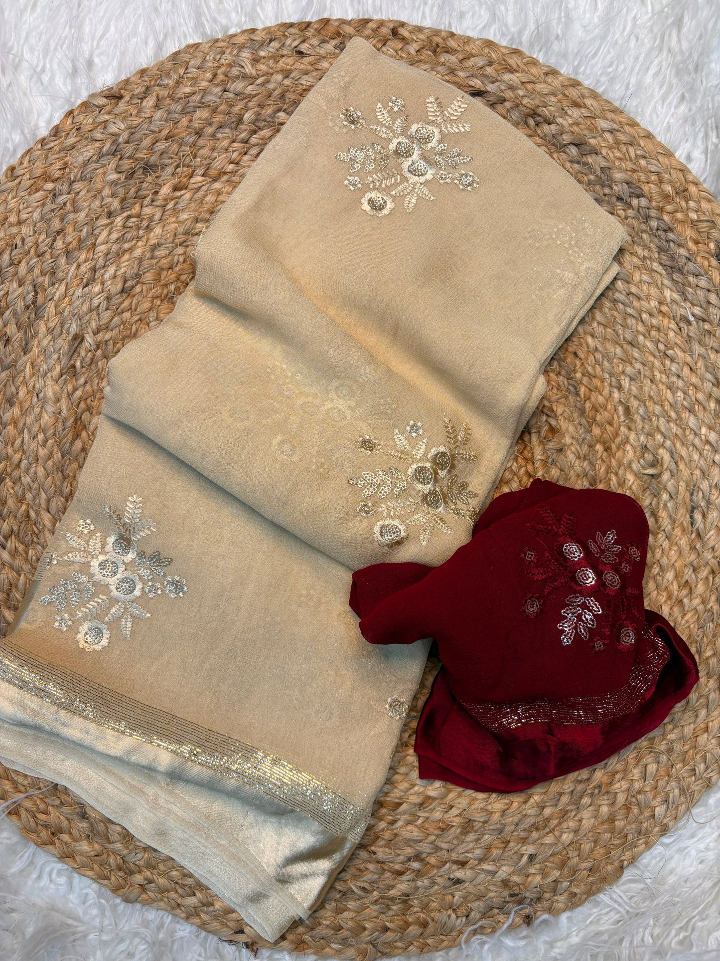 Viscous georgette saree with floral embroidery and satin border