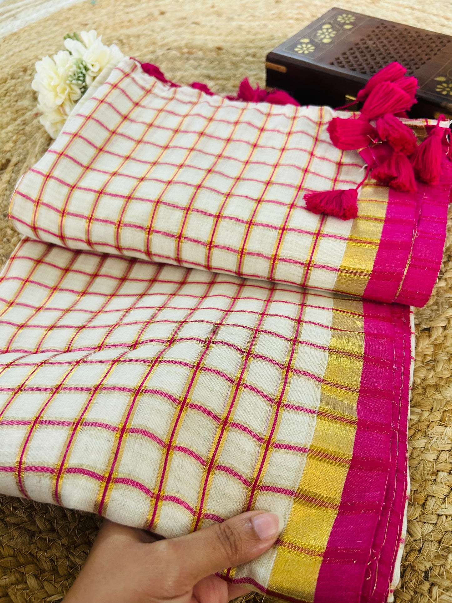 Pure and authentic mul cotton saree with pink zari checks and small border