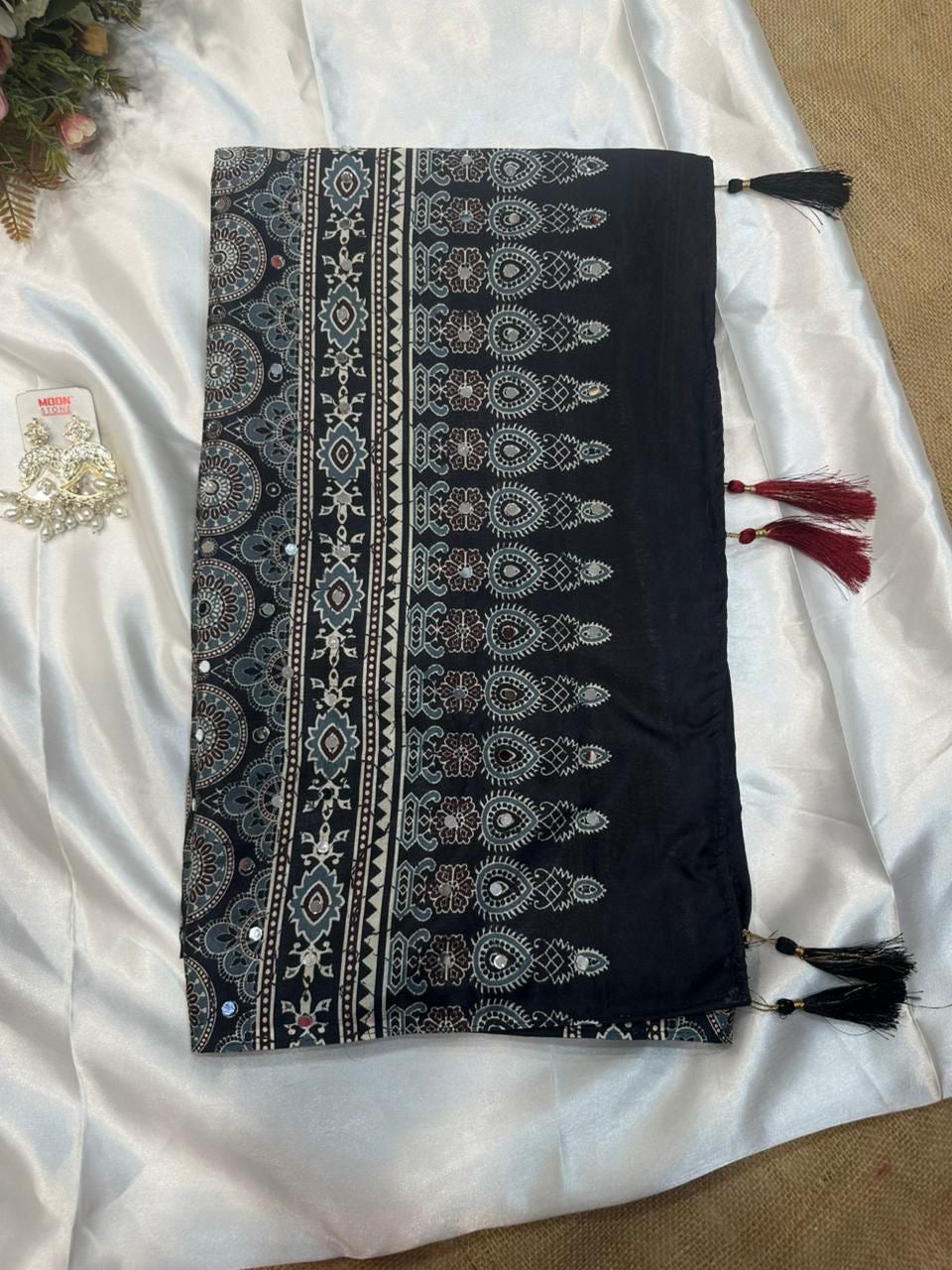 Beautiful semi crepe silk saree with ajrakh prints and mirror work
