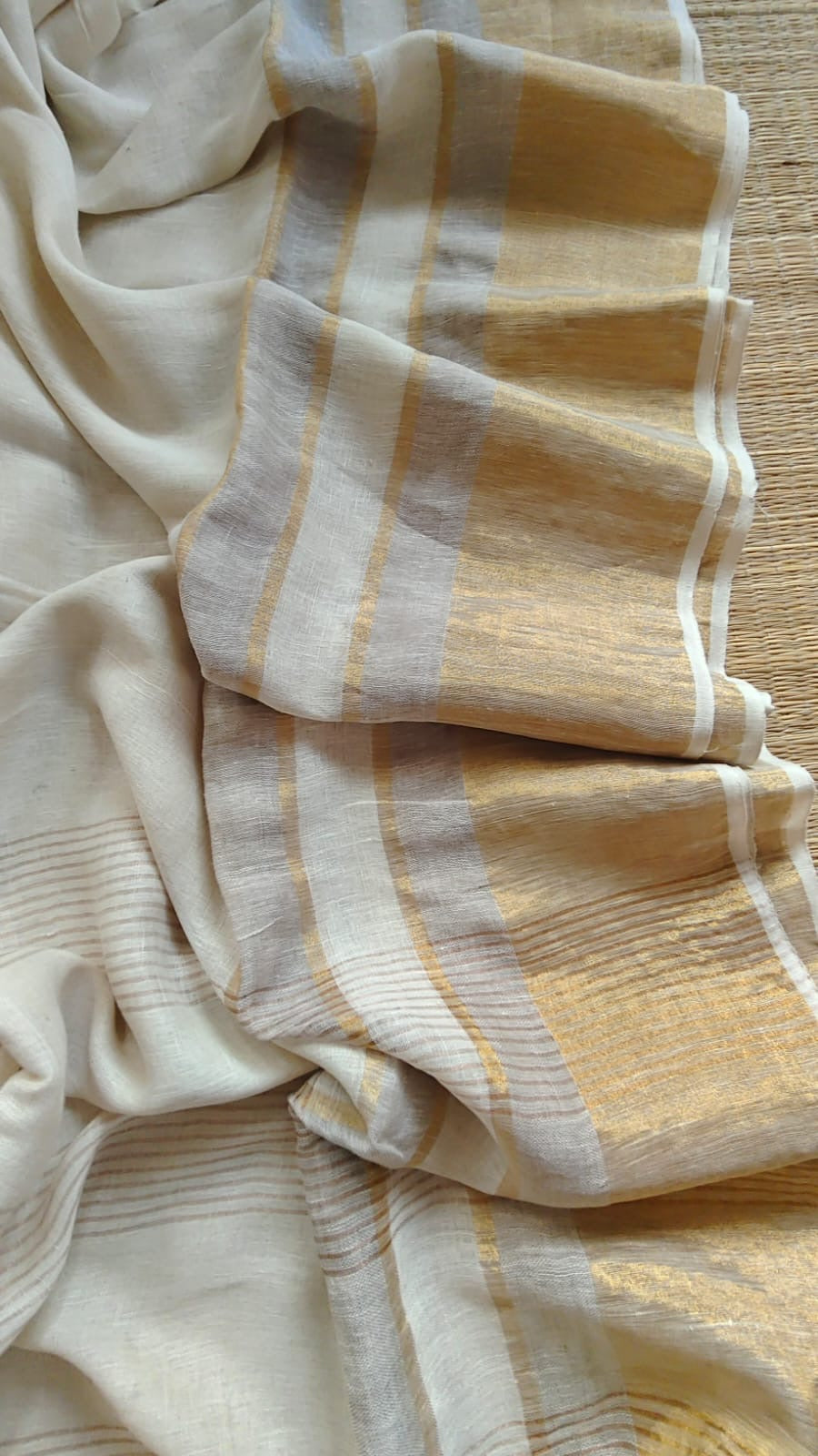 Pure handwoven linen saree with zari borders