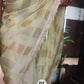 Pure organza tissue in silver and gold zari stripes saree
