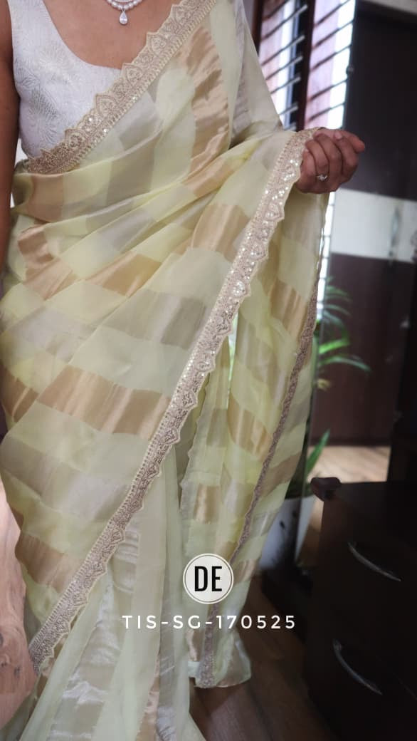 Pure organza tissue in silver and gold zari stripes saree