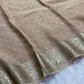Soft Viscous georgette saree in beige shade with small beautiful jacquard buttas and contrast blouse