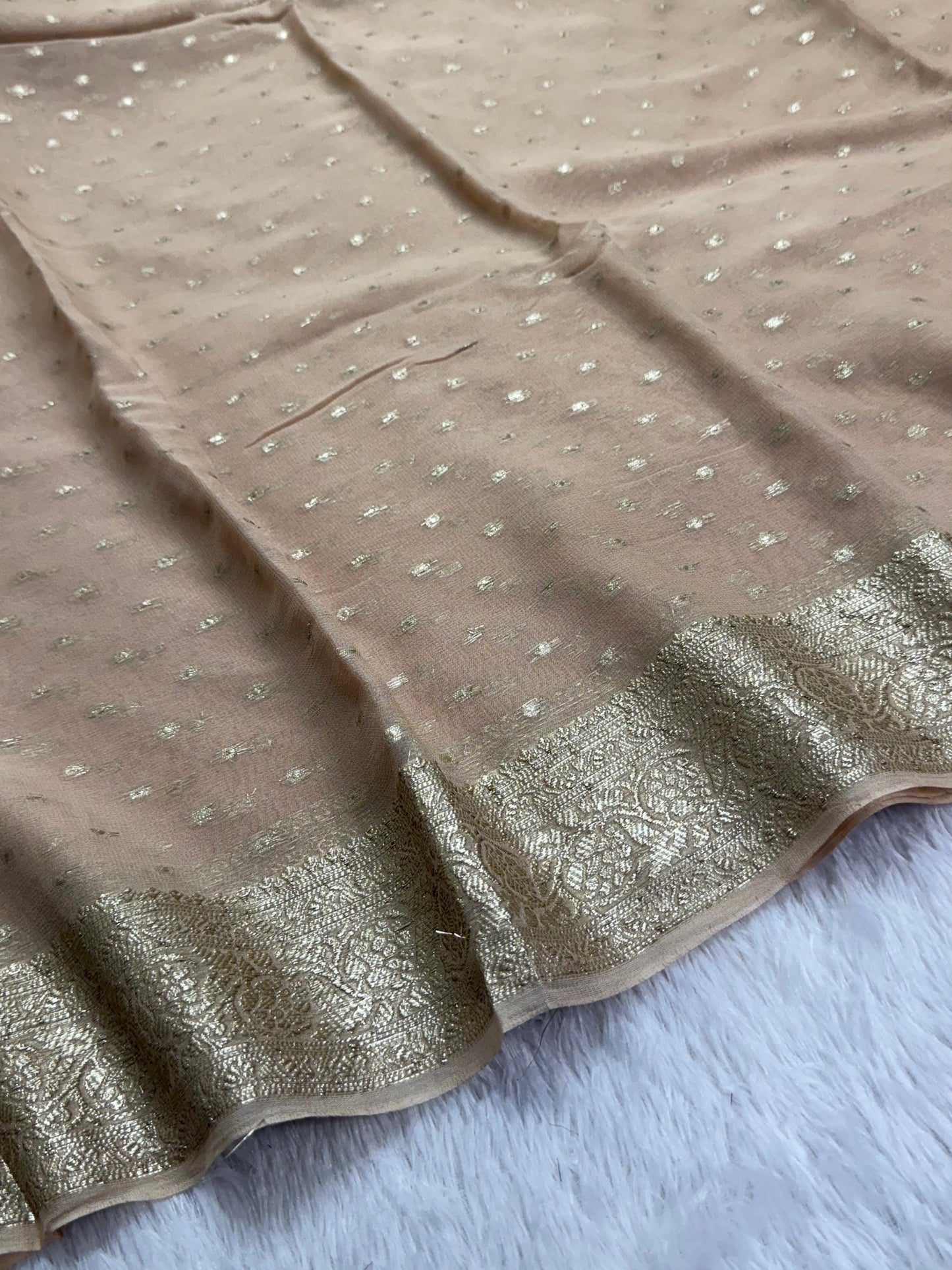 Soft Viscous georgette saree in beige shade with small beautiful jacquard buttas and contrast blouse