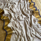 Pure authentic Mul Cotton saree adorned with delicate gold polka dots and a rich zari border for timeless festive elegance.