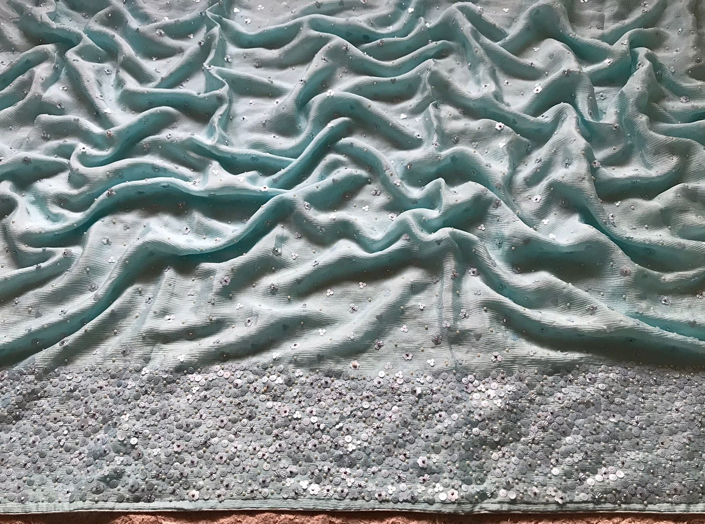 Pure Chinnon Silk saree with pearl sequins handwork