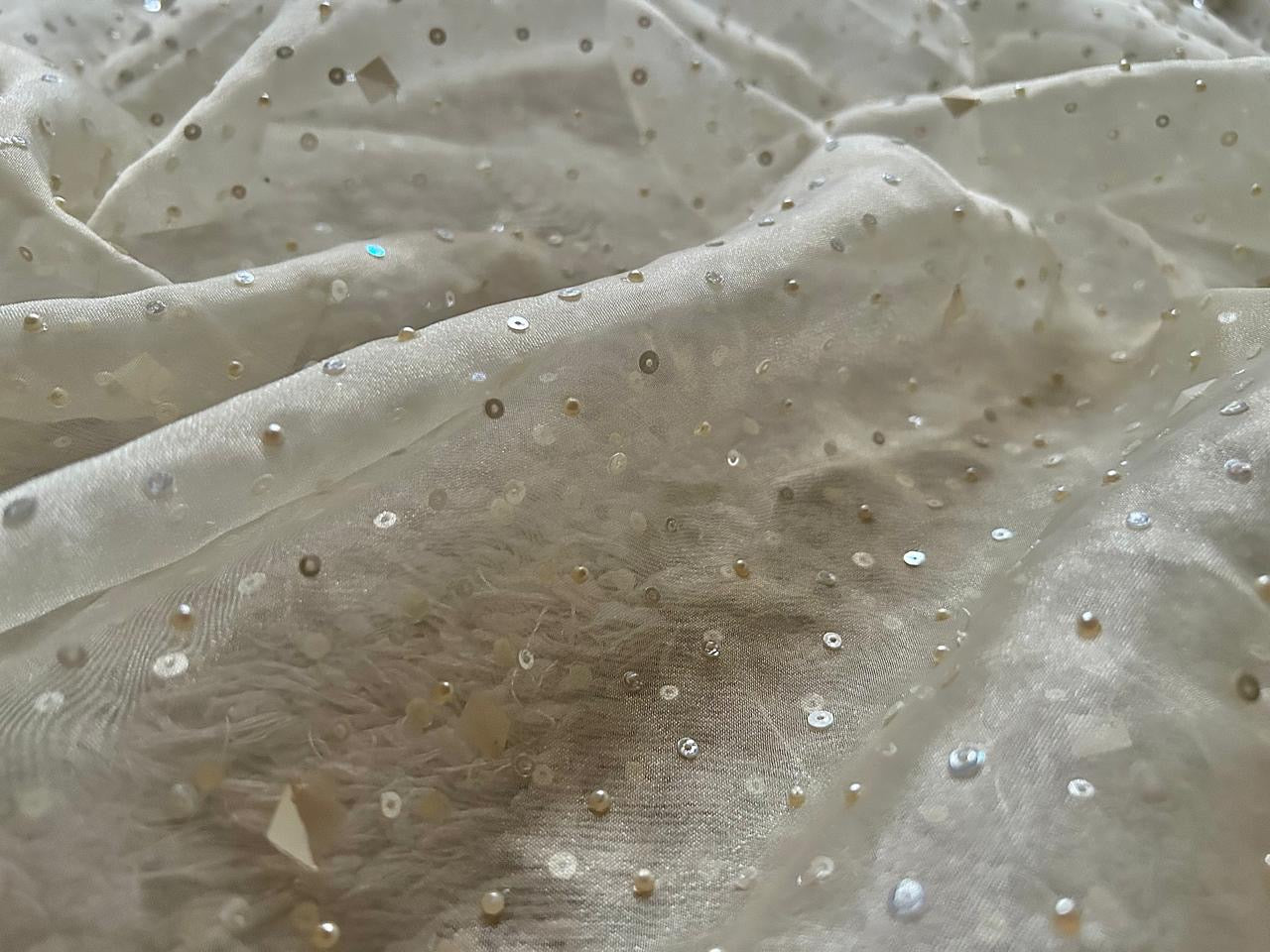 Pure tissue silk saree with pearl sequins handwork