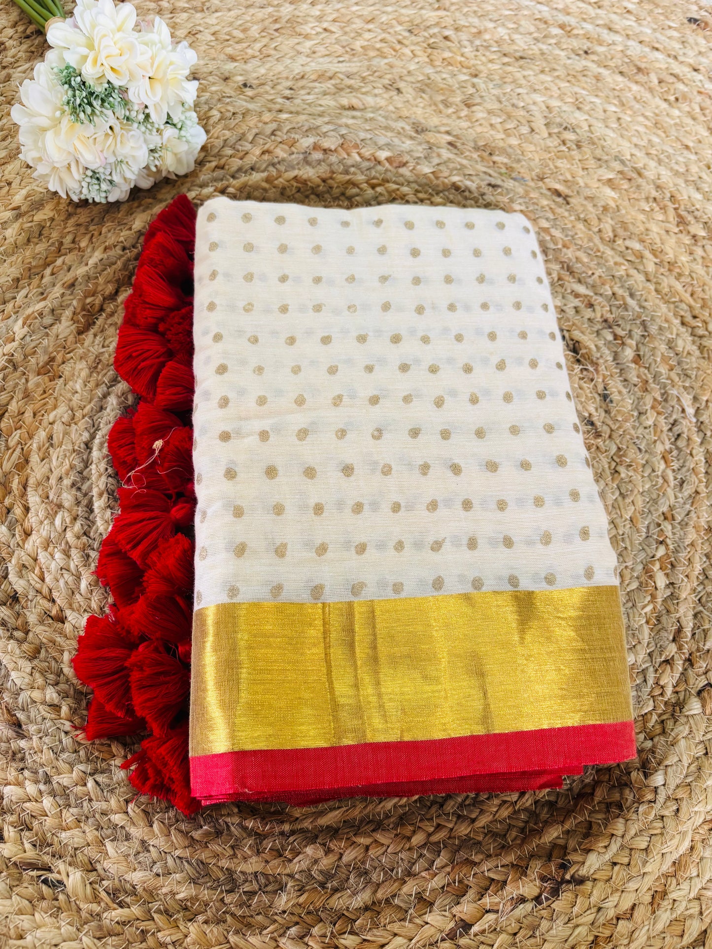 Pure authentic Mul Cotton saree adorned with delicate gold polka dots and a rich zari border for timeless festive elegance.