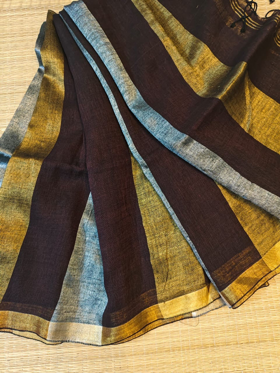 Linen sarees with gold silver zari stripes all over!