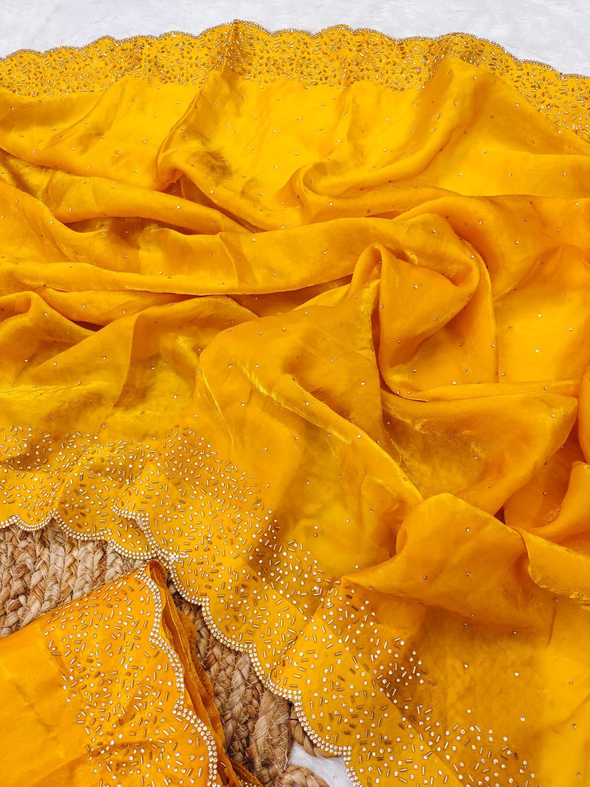 Premium space silk saree with cutdana work