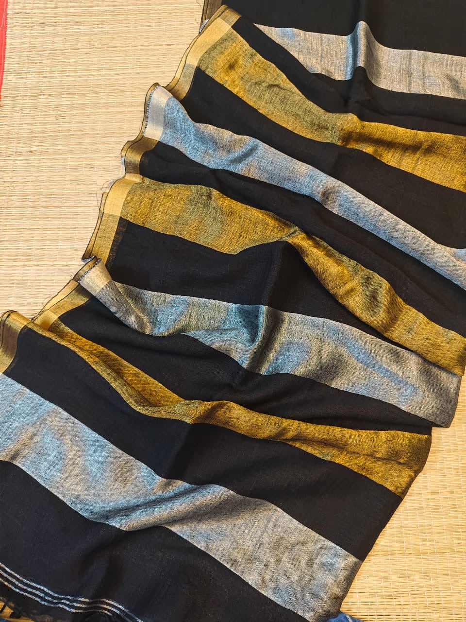Linen sarees with gold silver zari stripes all over!