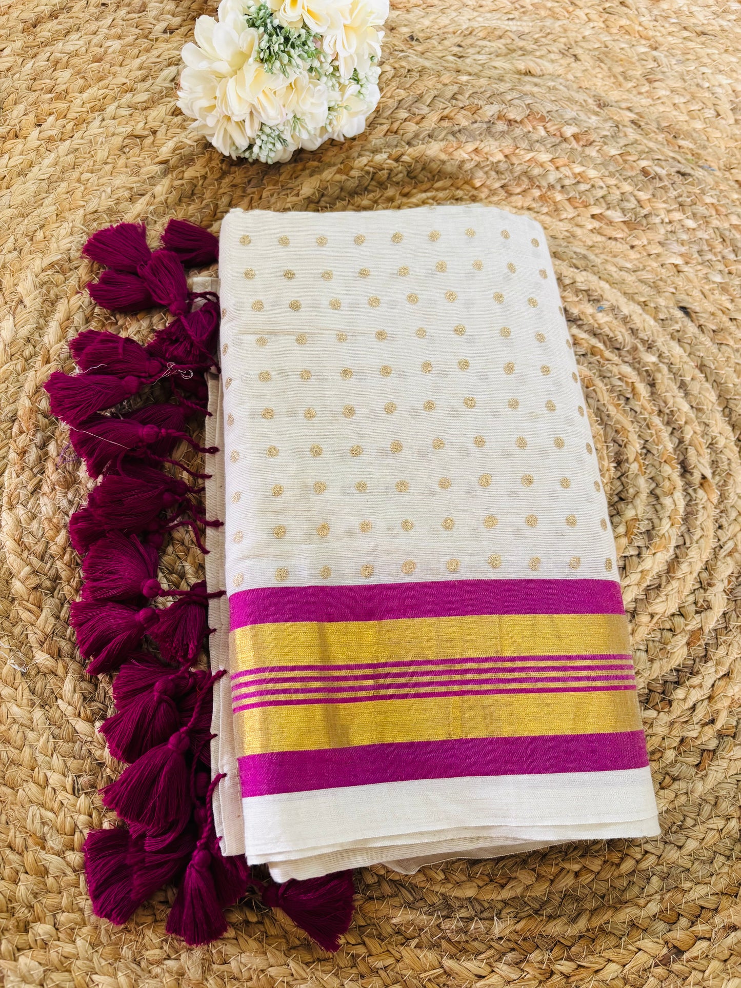 Pure authentic Mul Cotton saree adorned with delicate gold polka dots and a rich zari border for timeless festive elegance.