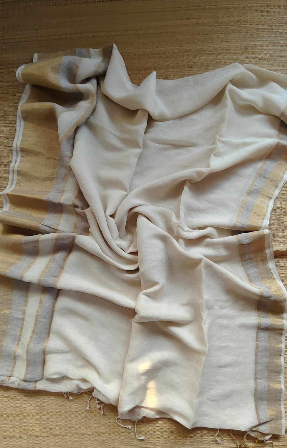 Pure handwoven linen saree with zari borders