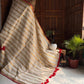 Beautiful pure authentic mul cotton saree with zari stripes and red border