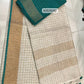 Pure linen checks saree with contrast blouse