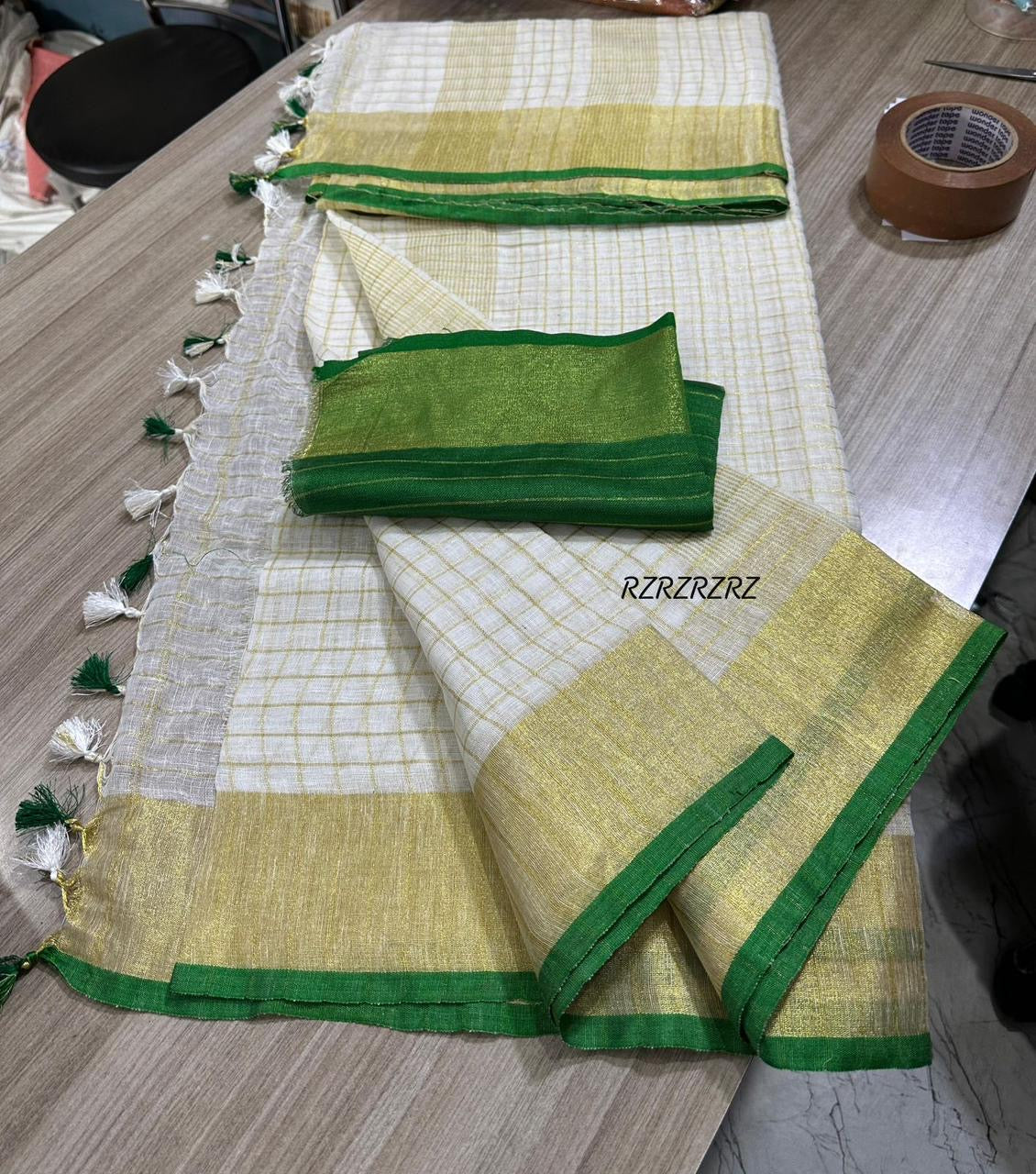 Pure linen checks saree with contrast blouse