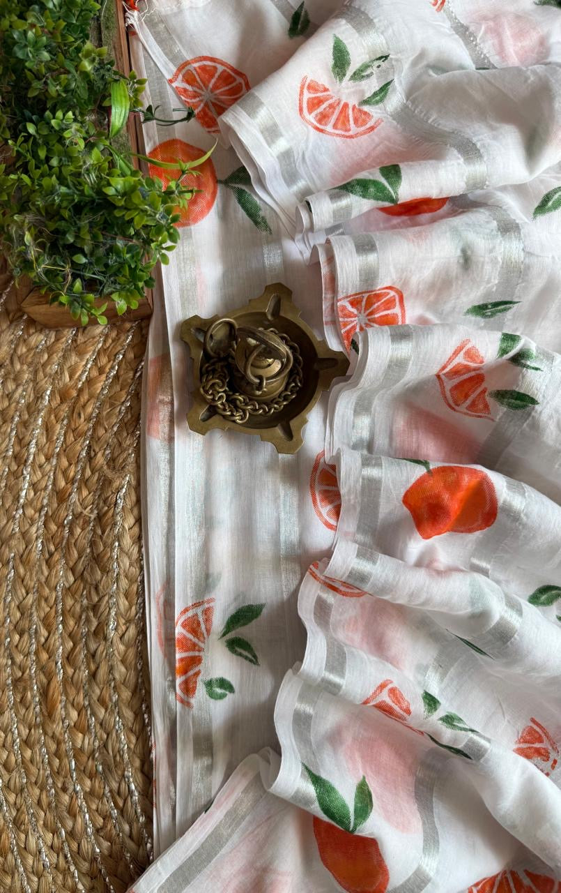 Pure mul cotton saree with cute prints and silver zari stripes