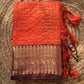 Beautiful semi Banarasi katan silk saree with checks in orange and brown combo