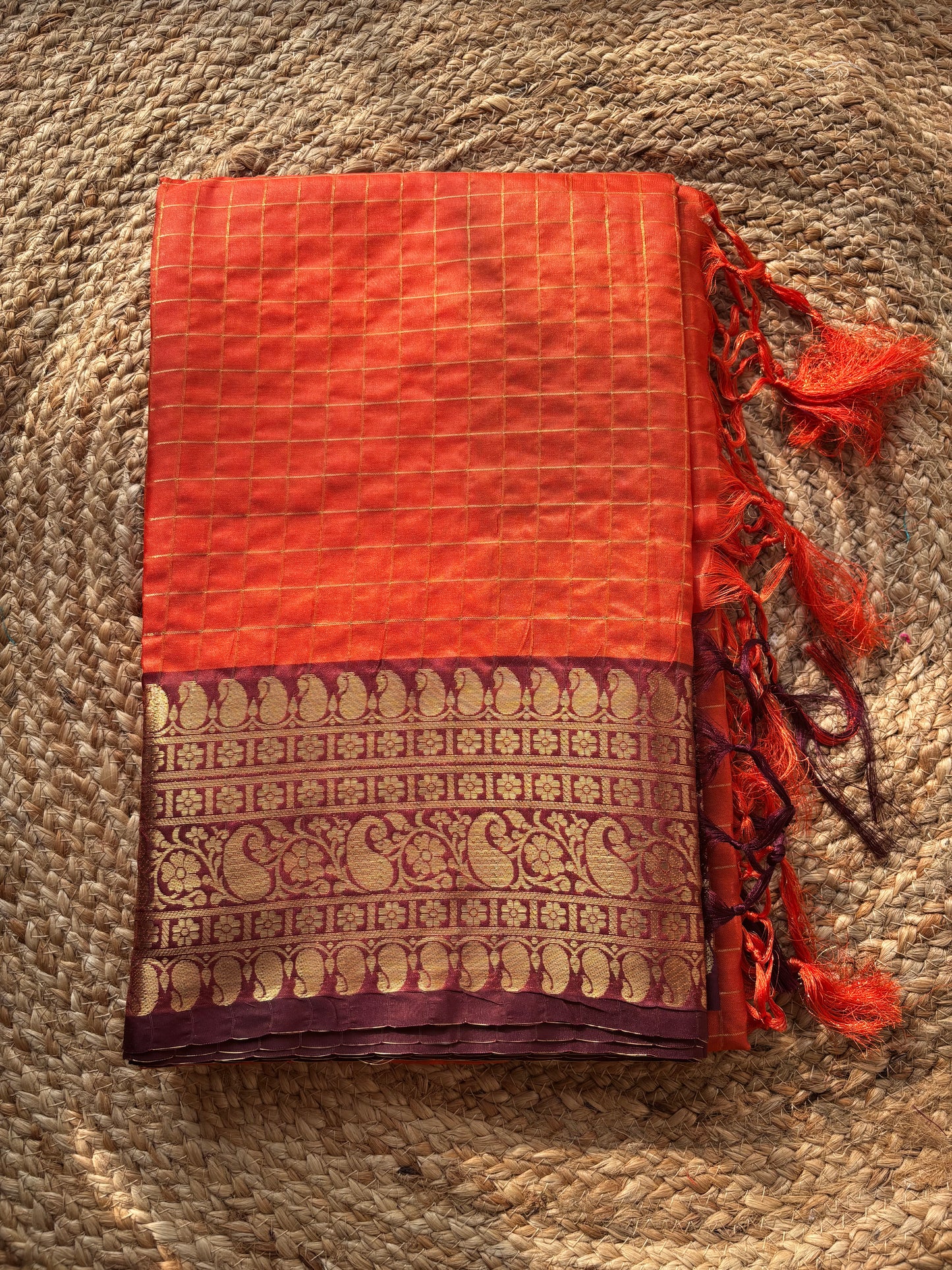 Beautiful semi Banarasi katan silk saree with checks in orange and brown combo