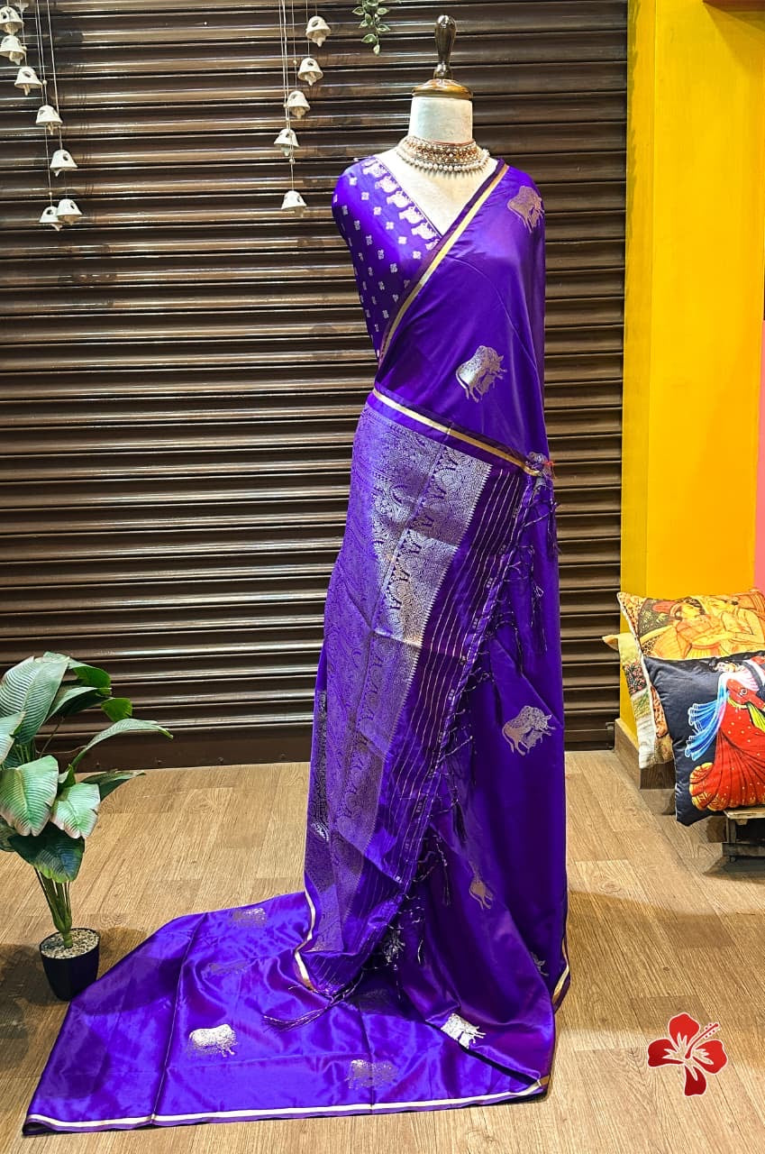 Beautiful semi satin silk saree with pichwai weavings