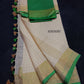 Pure linen checks saree with contrast blouse