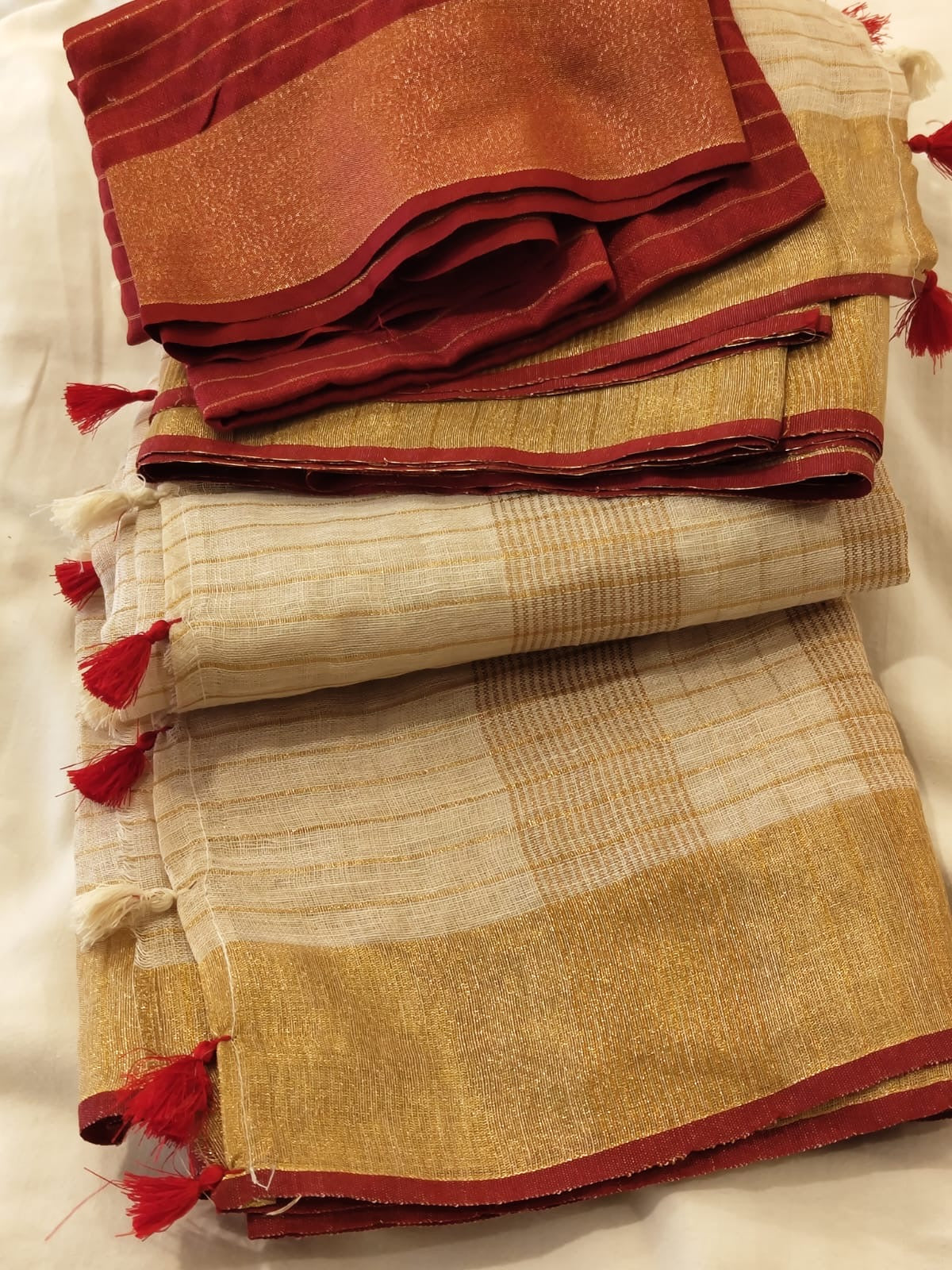Pure linen checks saree with contrast blouse