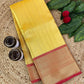 Banarasi tissue kanchi style yellow saree with contrast red border