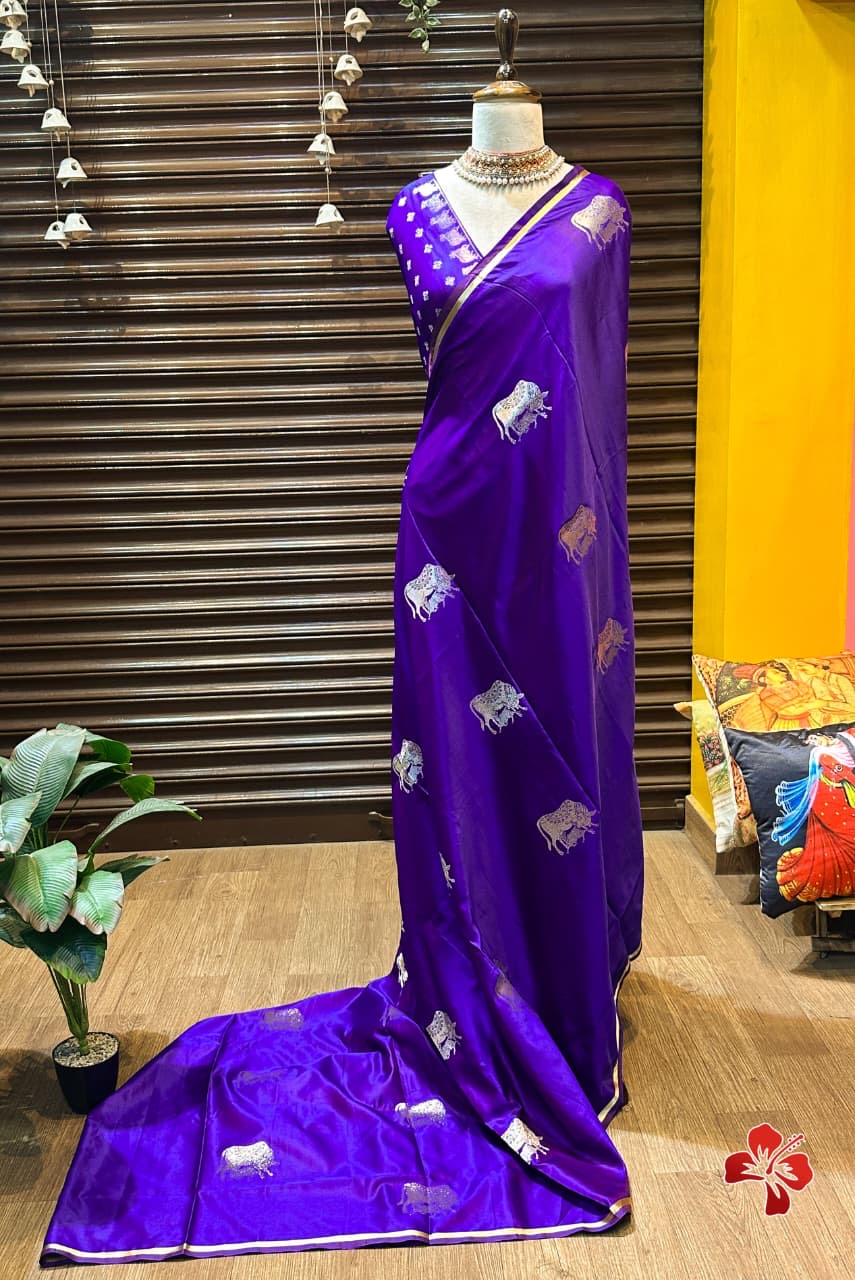 Beautiful semi satin silk saree with pichwai weavings