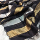 Beautiful georgette tissue silk saree with gold and silver tissue patta