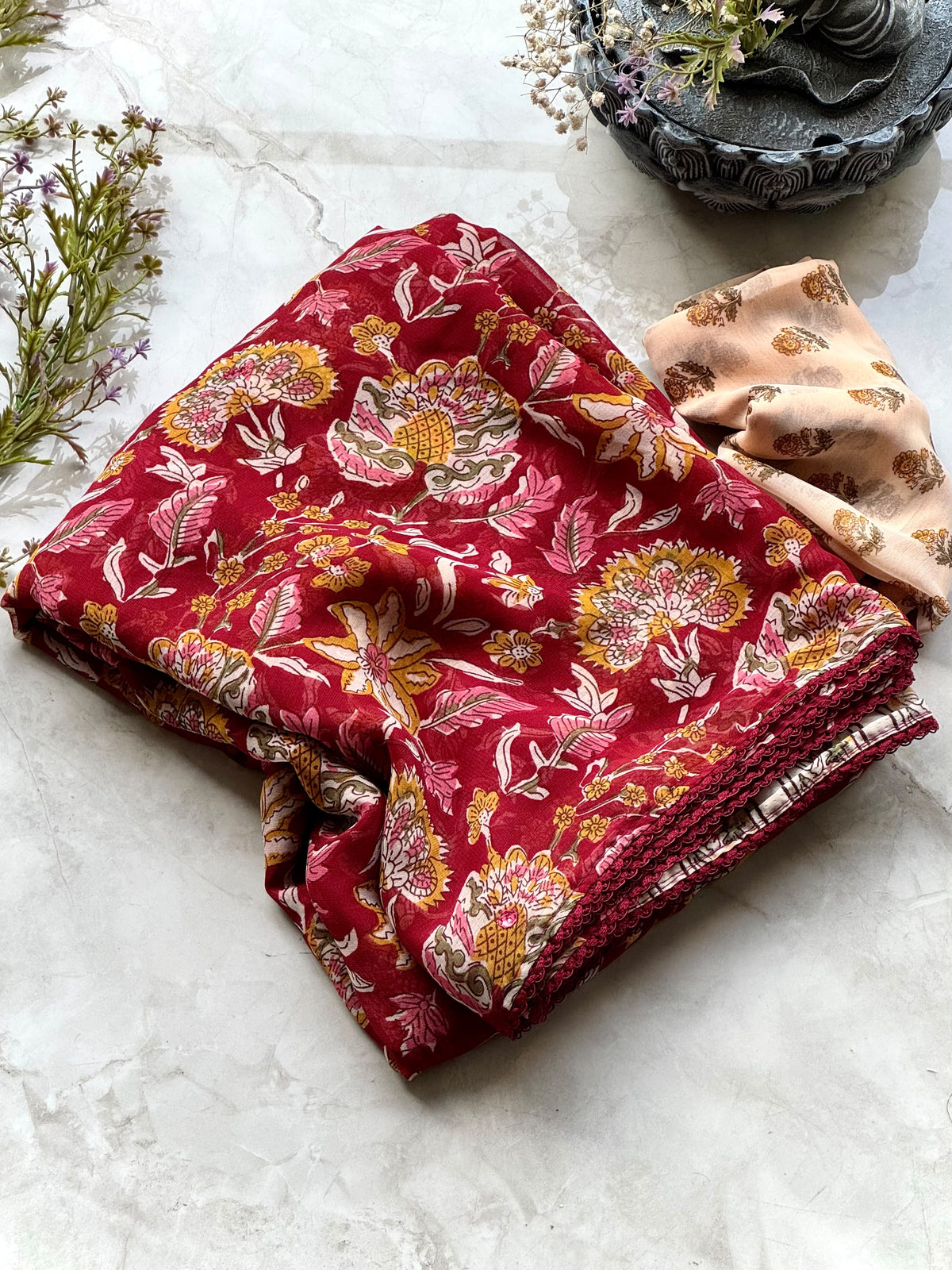 Beautiful georgette saree with kalamkari prints and lace detailing border