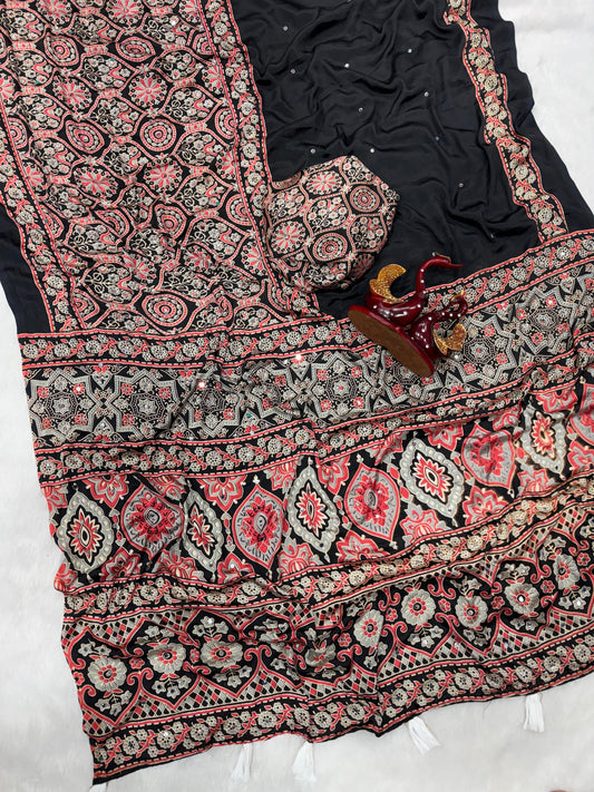 Soft and beautiful crepe silk saree with ajrakh prints and mirror work