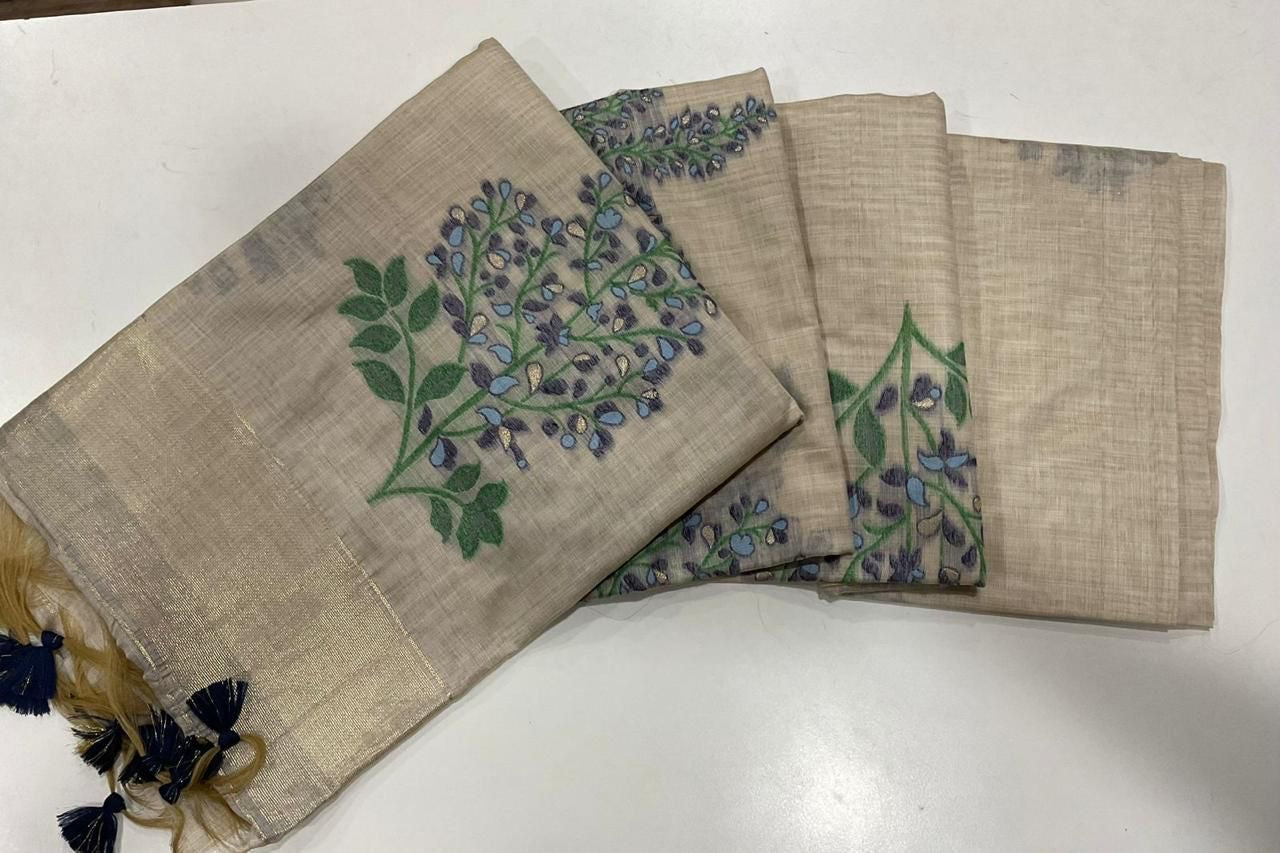 Soft off white muga cotton saree with floral weavings