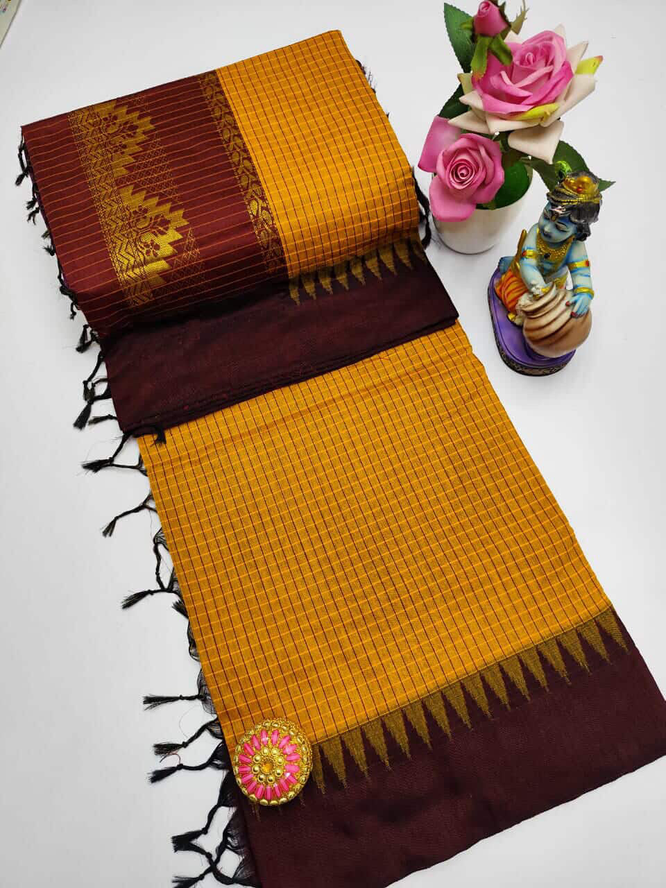 Gorgeous checked silk cotton sarees with solid temple border