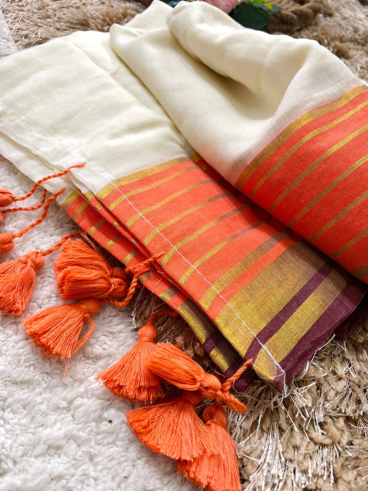 Premium pure mul cotton saree with orange and brown zari border