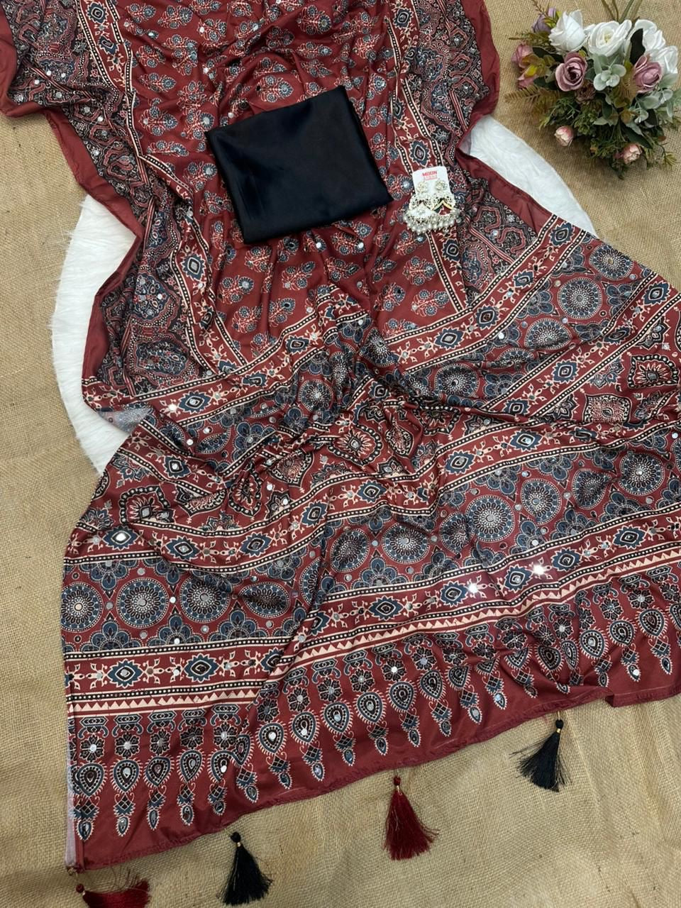 Beautiful semi crepe silk saree with ajrakh prints and mirror work