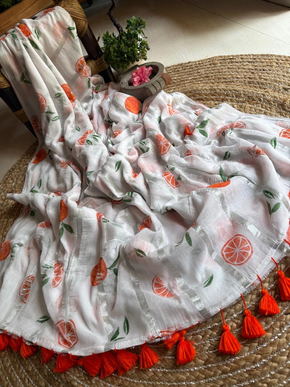Pure mul cotton saree with cute prints and silver zari stripes