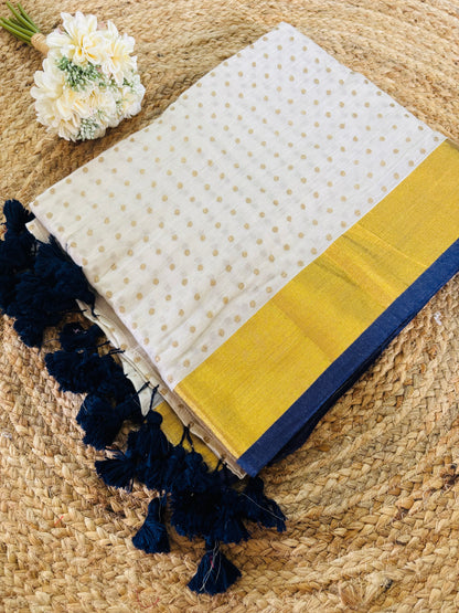 Pure authentic Mul Cotton saree adorned with delicate gold polka dots and a rich zari border for timeless festive elegance.