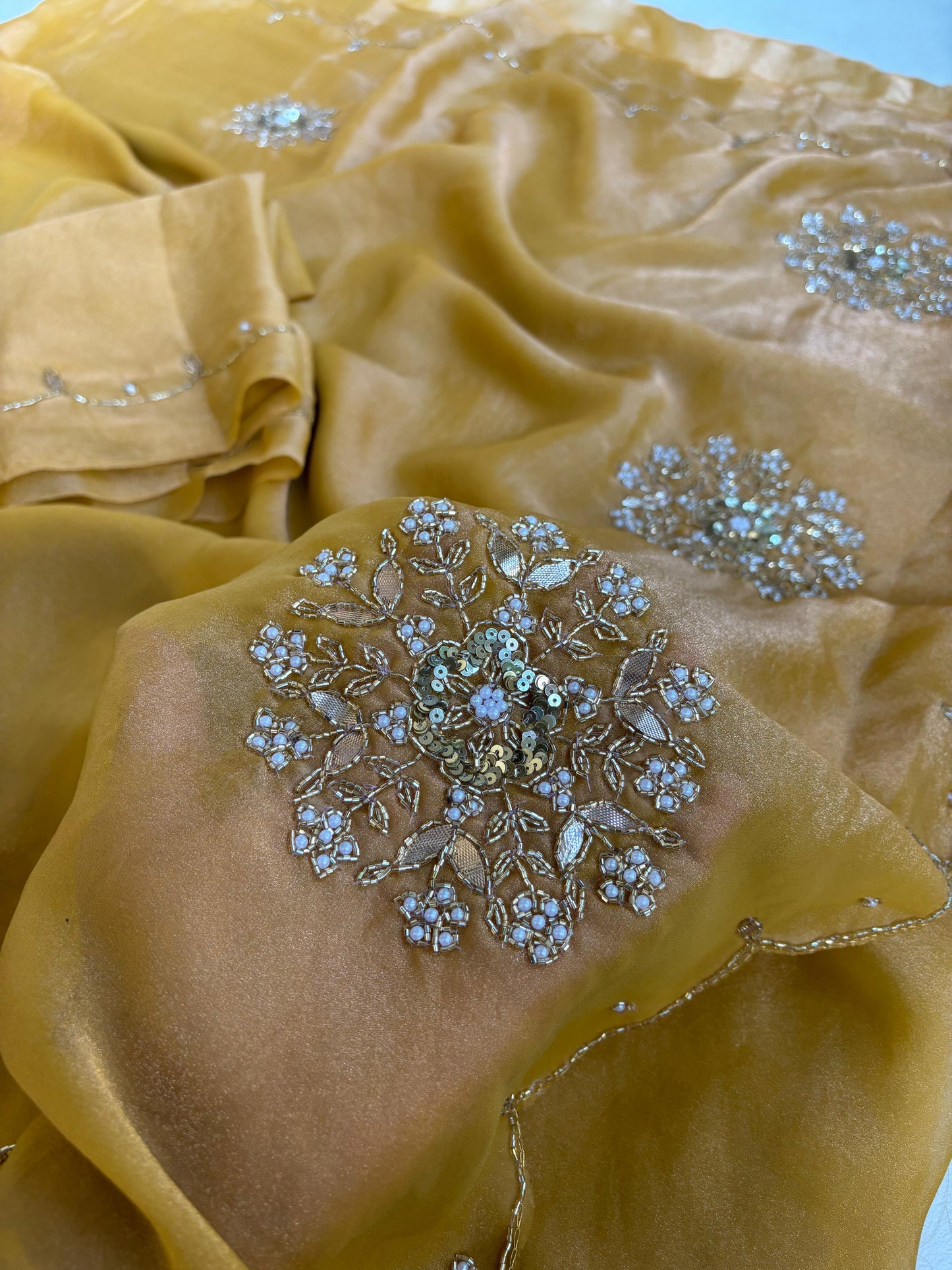 Beautiful soft two tone tissue silk saree with gotta, pearl and sequins work