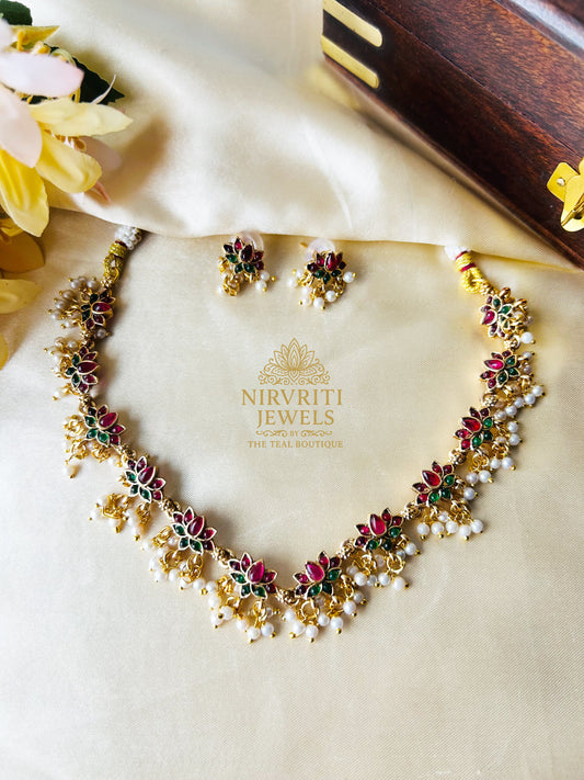Lotus charm necklace with pearl beads