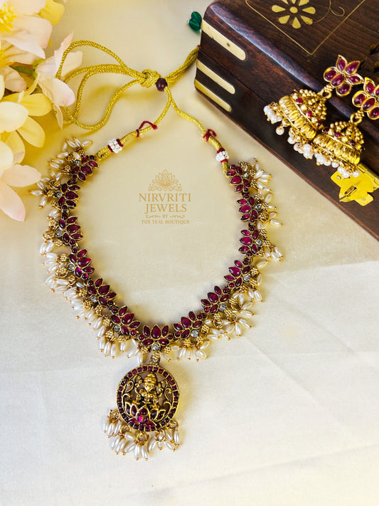 Beautiful lakshmi pendant lotus necklace with rice pearls - ruby